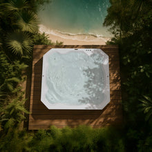 Cargar imagen en el visor de la galería, jacuzzi blanco con hidromasaje en terraza exterior en la playa, con luz de sol y plantas